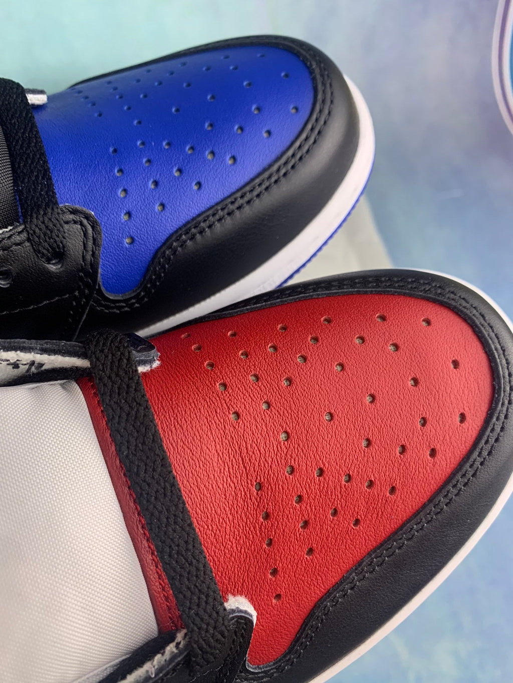 Air Jordan 1 High White, Blue, and Red Asymmetrical Pair Unisex Sneakers