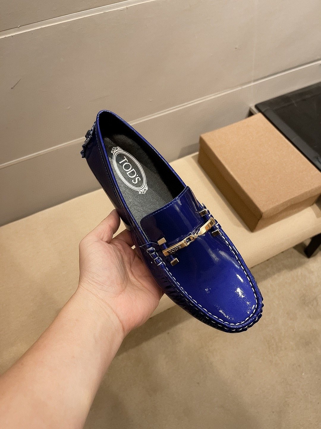 Tod's Glossy Metal Bar Loafers