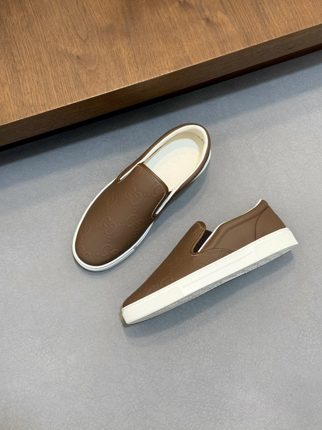 Gucci Embossed Slip-On Sneakers